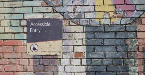 Accessibility Sign on Wall