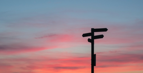 Signposts at sunset