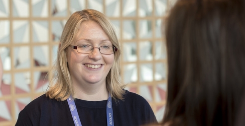 Stella Power talking to someone at DrupalCon Dublin