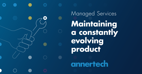A hand, illustrated in white, tightens a nut with a wrench to illustrate the job done by Annertech's Managed Services team. Next to it, the text reads: Maintaining a constantly evolving product. 