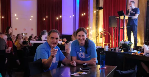 Ricardo José Flores Galán and Alison Visser take a break from running at Trivia Night in Barcelona 2024.