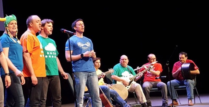 Ricardo Galans onstage playing the bodhrán