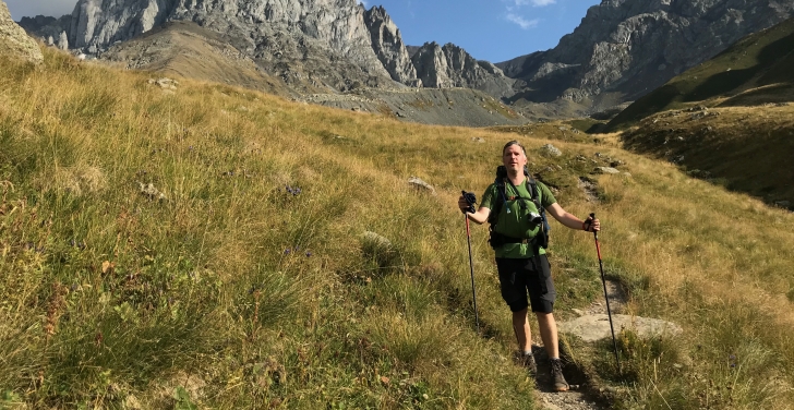 Petr Illek on a hike, out in nature.