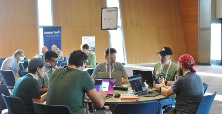 Developers work away in the DrupalCon Contribution room. Photo by Joris Vercammen