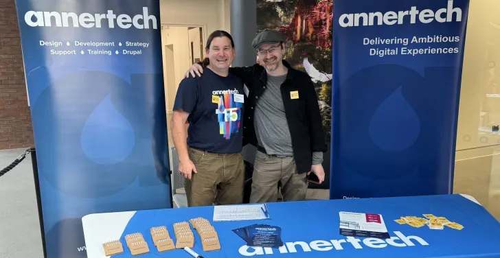 Simon White and Daniel Pickering stand at the Annertech booth.