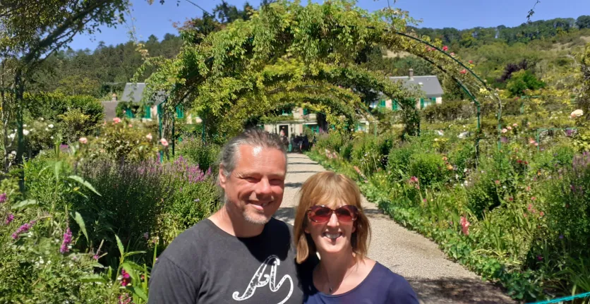 Anthony Lindsay and Claire O'Brien are in the lush surroundings of Monet's garden in France.