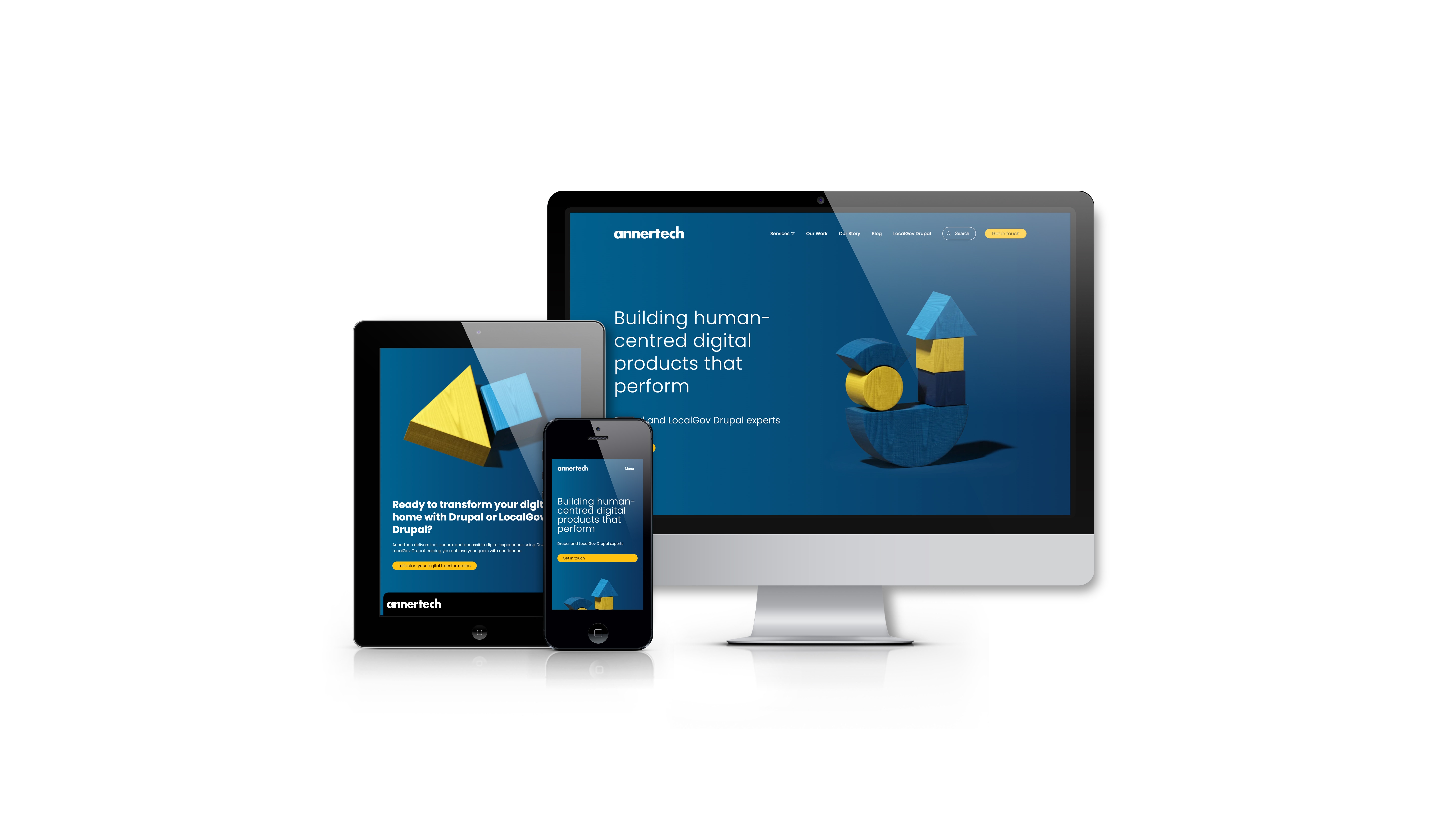 The new Annertech website is seen on various screens.