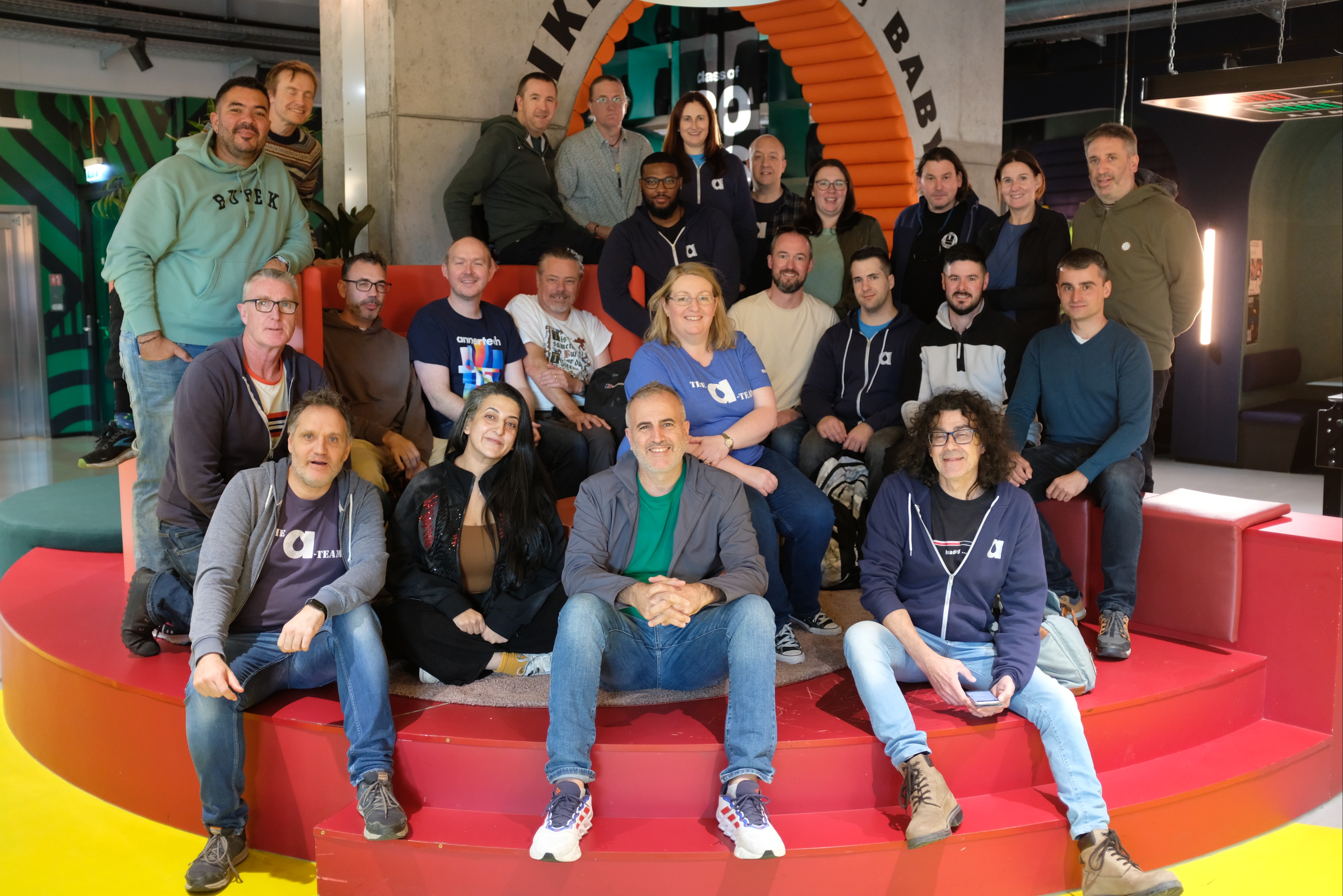 Annertech team members pose in the entrance of the Social Hub, Vienna.