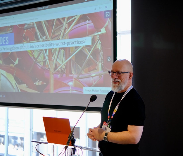 Christopher Torgalson is mid-presentation at DrupalCon.