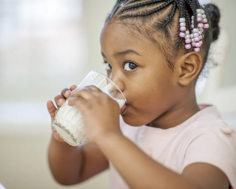 Glanbia Girl Drinking Milk