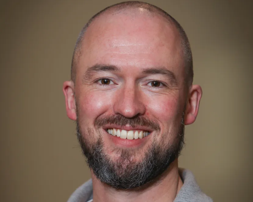 A head and shoulders image of Luke Brennan
