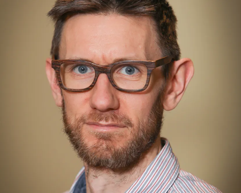 A head and shoulders image of Tom Bamford