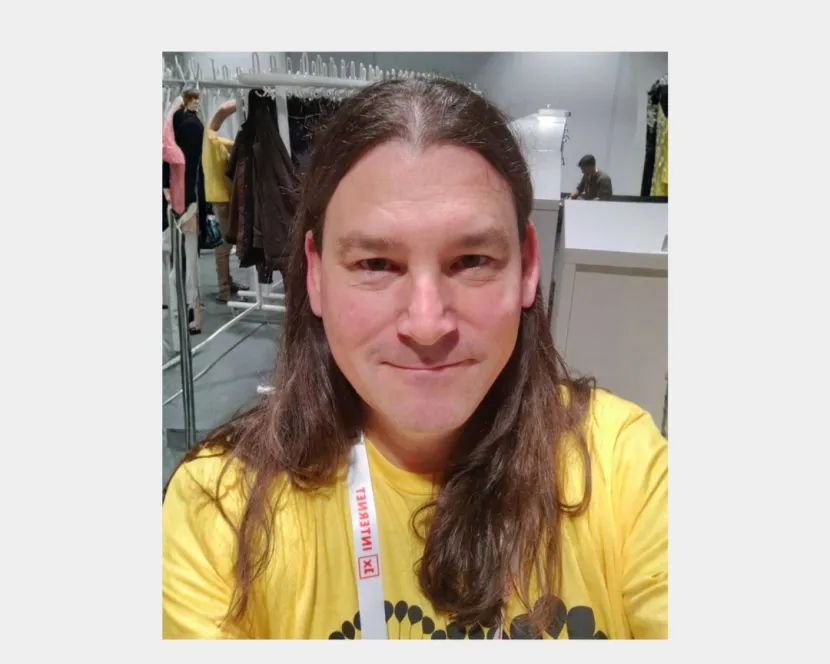 Simon white in the cloakroom of DrupalCon Vienna 2025.