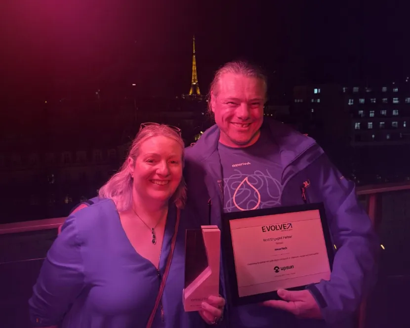 Stella and Anthony post with the Best Partner award.