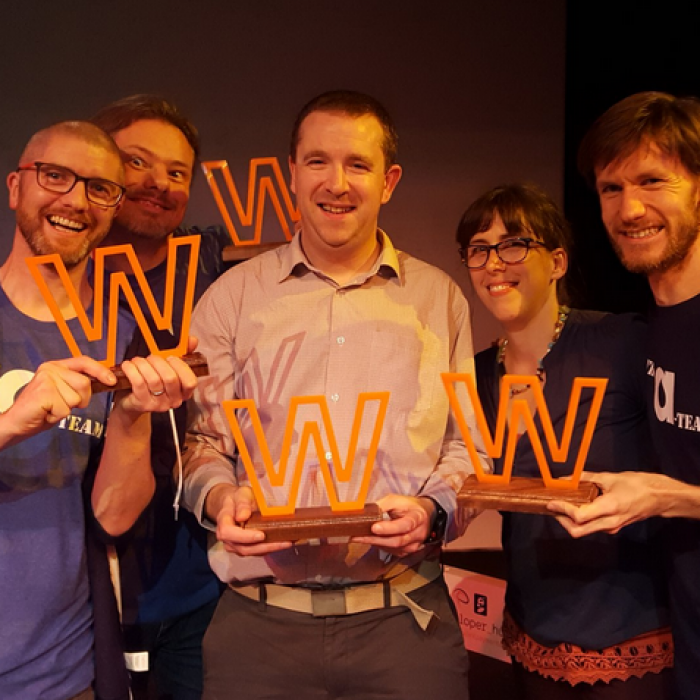 Annertech staff holding multiple awards, including Web Agency of the Year