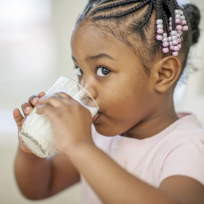 Glanbia Girl Drinking Milk