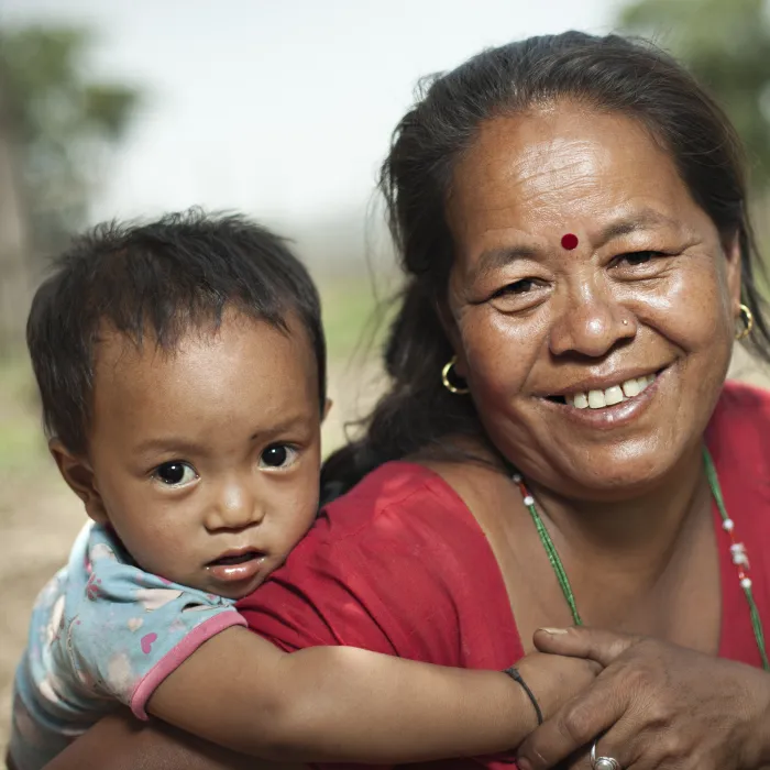 Oxfam Lady with Child on her Back