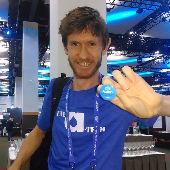 Tom with his Acquia certification badge