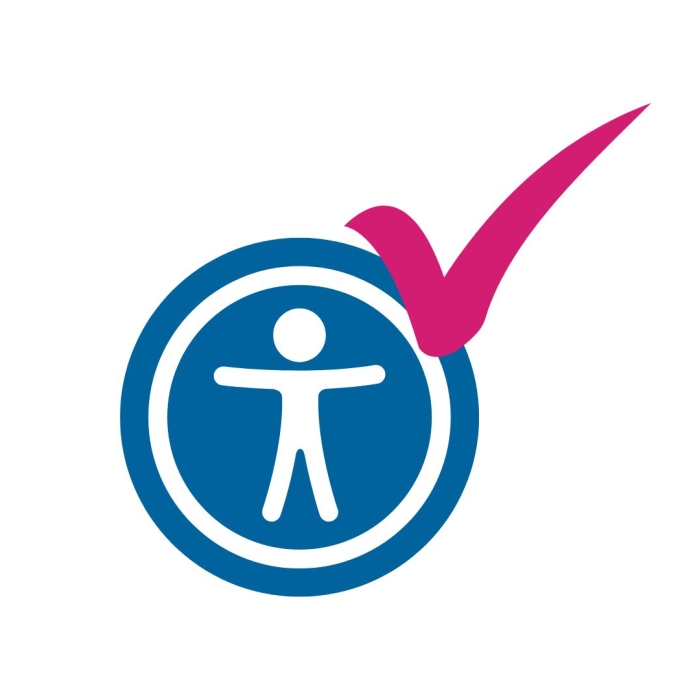 A blue accessibility icon with a pink tick next to it.
