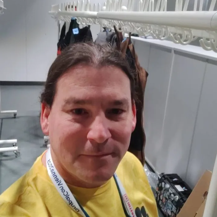 Simon white in the cloakroom of DrupalCon Vienna 2025.