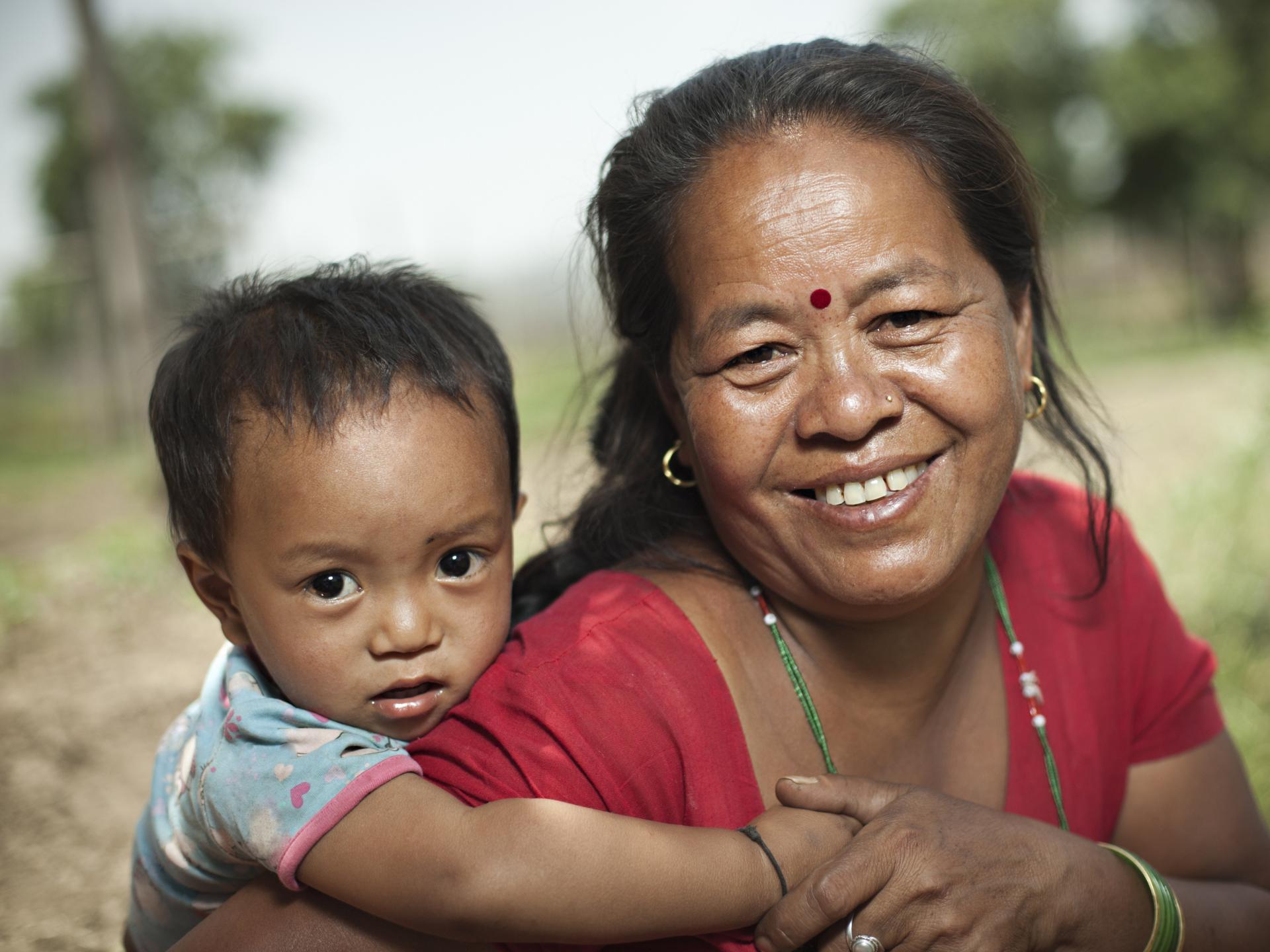 Oxfam Lady with Child on her Back