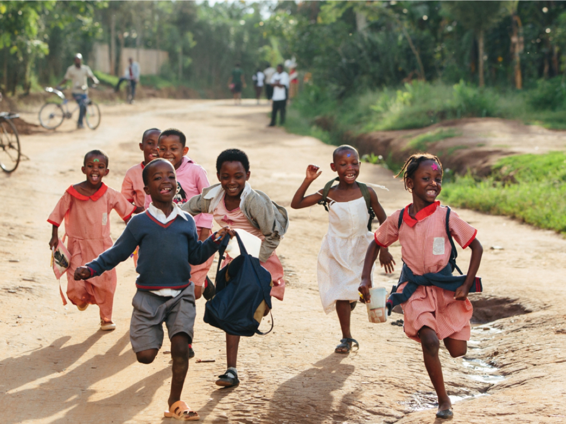 Happy school children running - photo of those Bóthar is helping