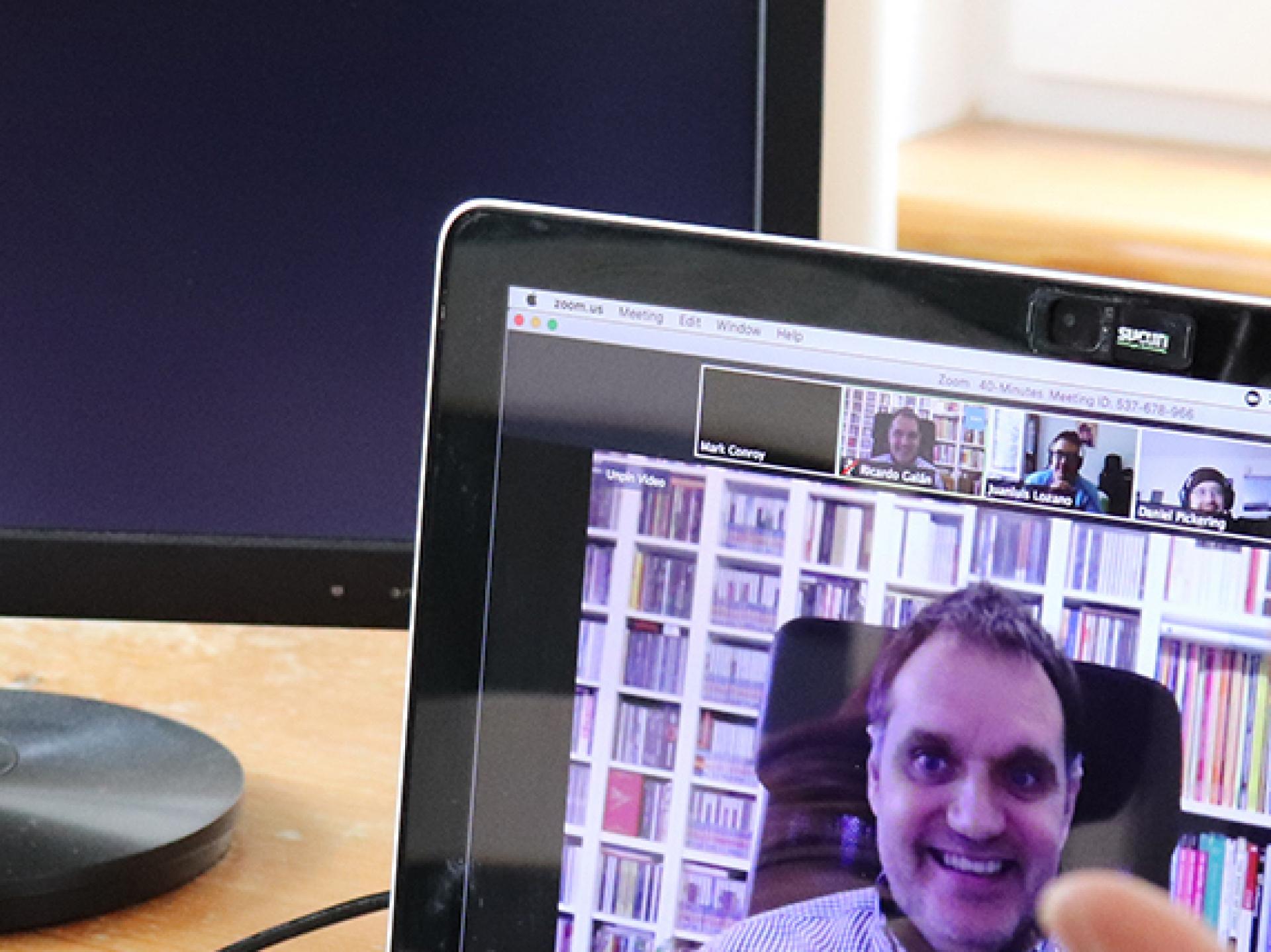 Two people sitting at a laptop | Support Team | Annertech services