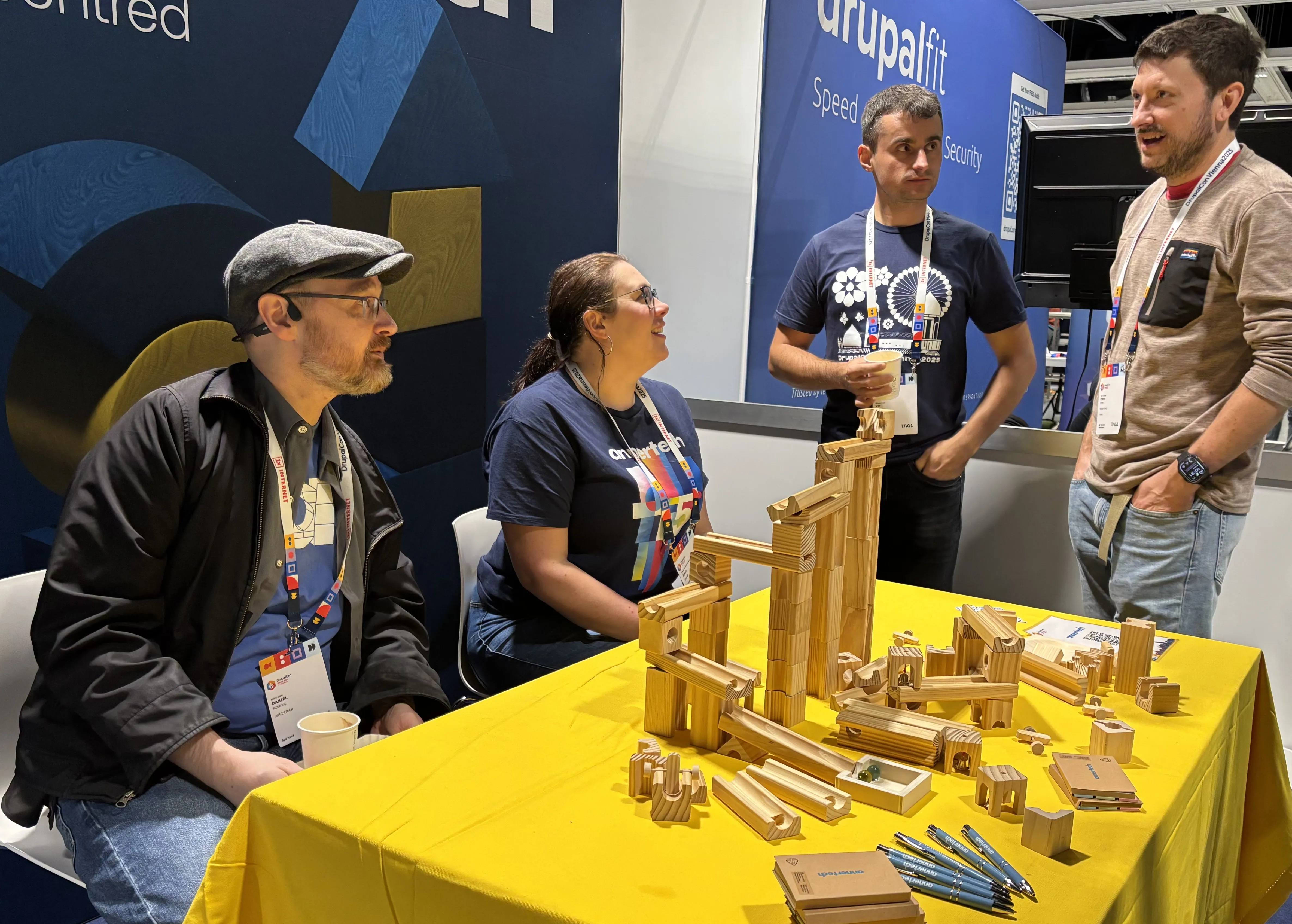 Annertechies talk to a developer at DrupalCon Vienna