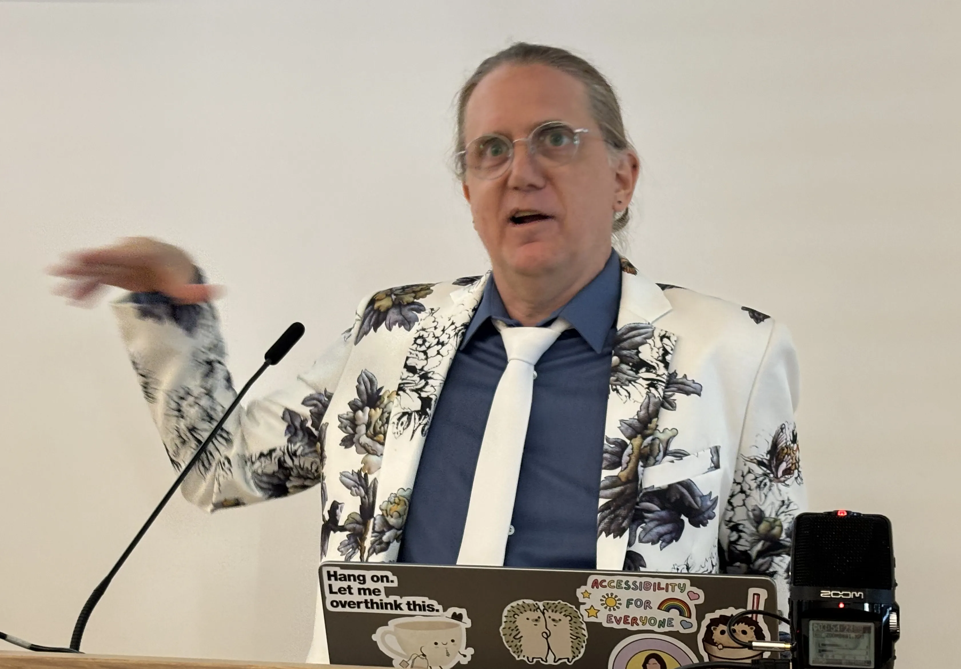 John Albin delivers a talk.