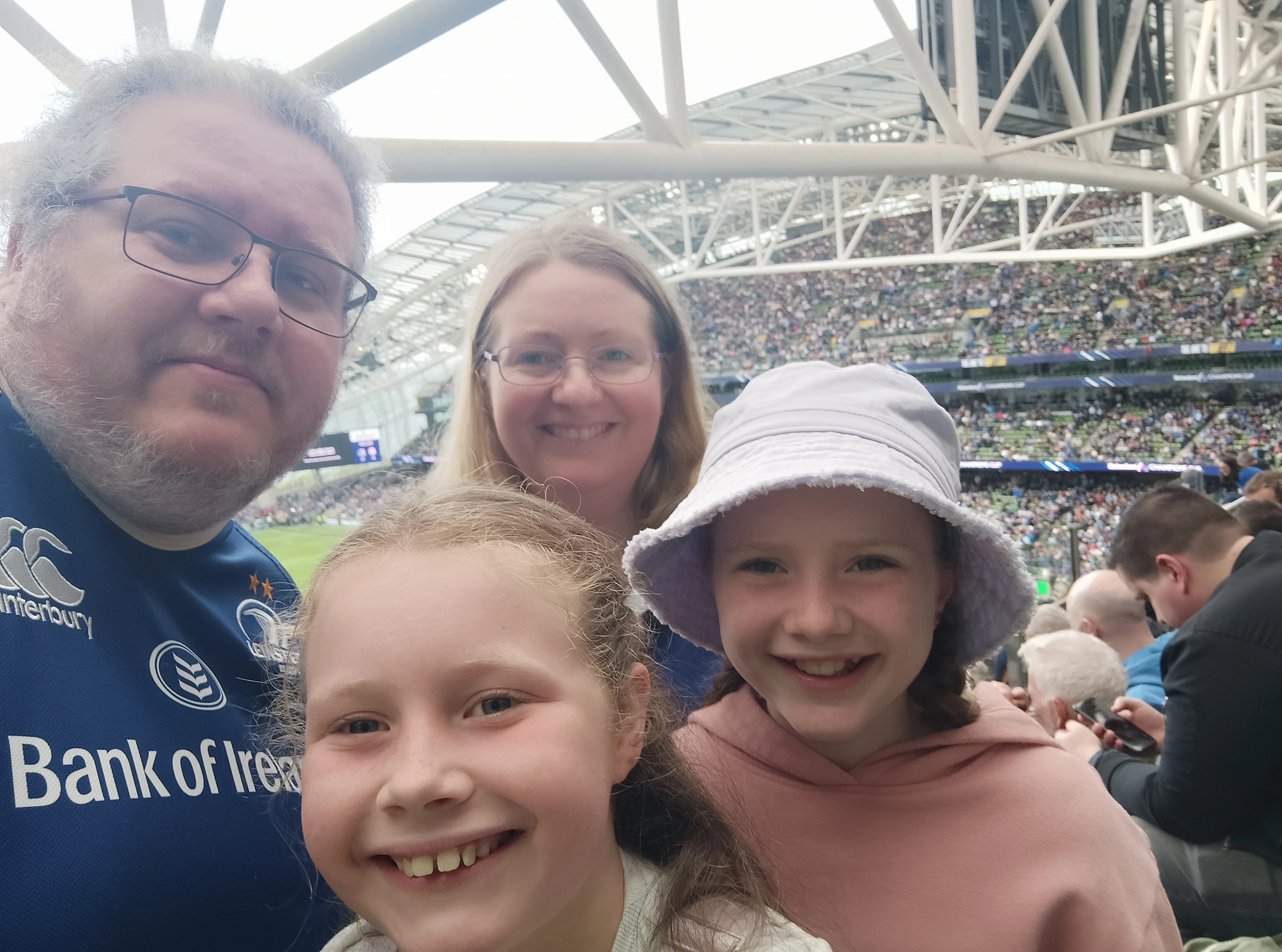 The Frost/Power family in a stadium.